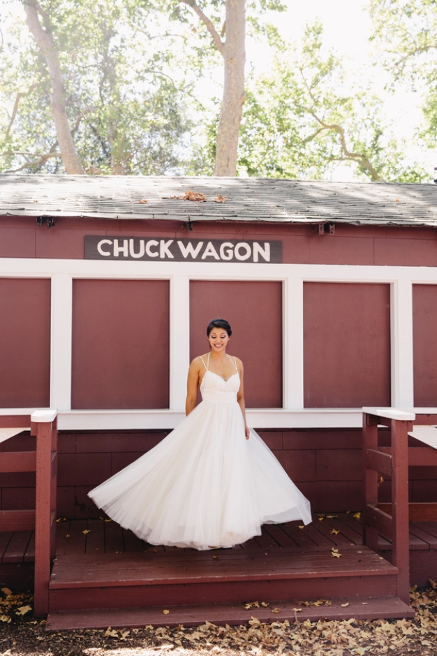 bride-spinning-in-wedding-dress-outside