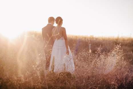 bride-and-groom-in-field